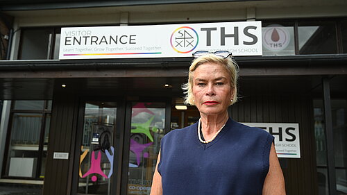 Rachel in front of Tiverton High School